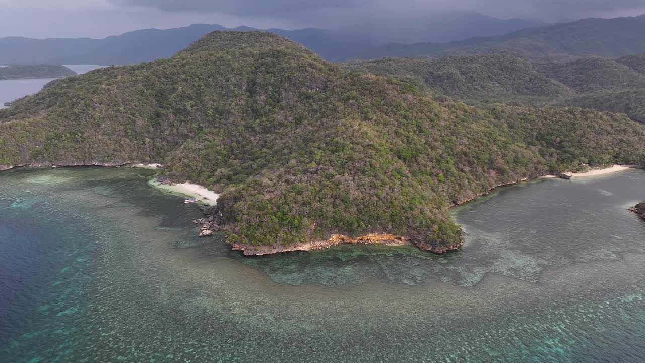 Untouched tropical landscape landscape. Aerial Labuan Bajo around Rangko Cave, Indonesia.