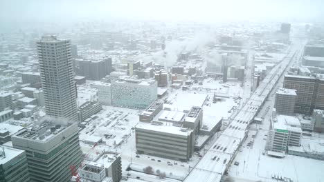 snowed in industrial city during winter. urban cityscape