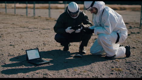 scientists inspecting a site