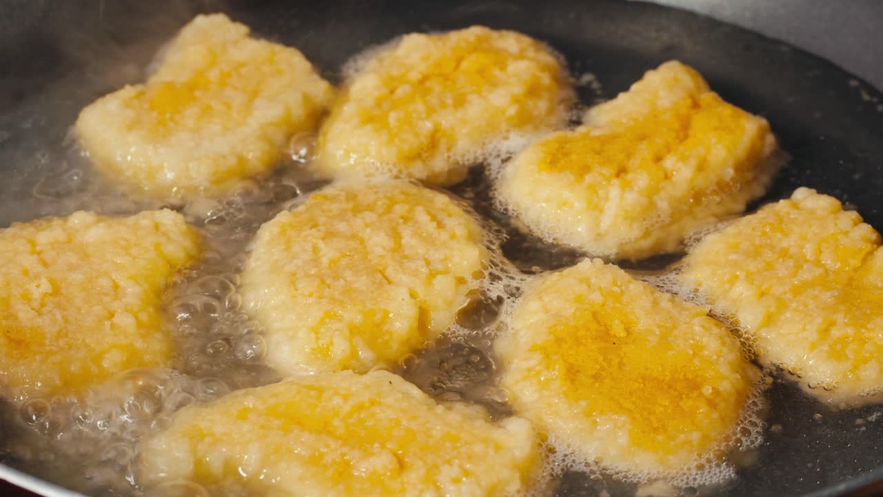 Fried Food Being Cooked in a Pan