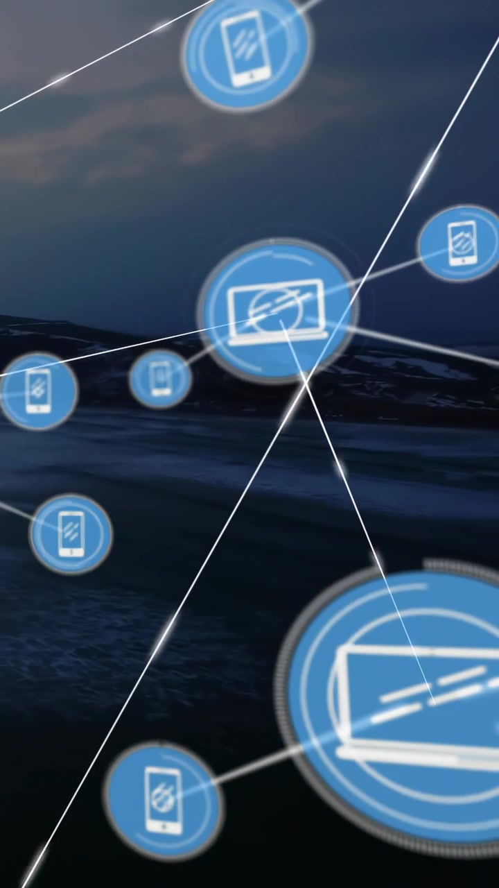 Video verticale: Reticolo che appare, icone che si ancorano, si collegano e crescono sulla costa, mostrando una rete tecnologica.