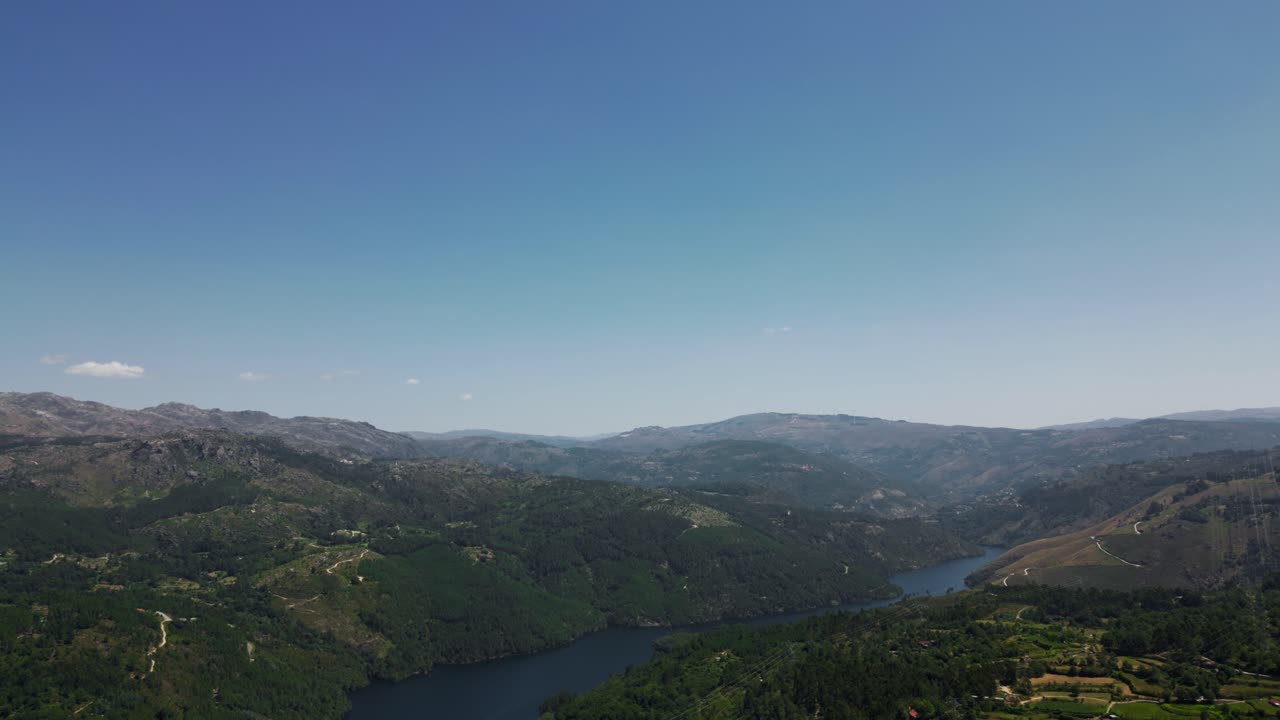 Aerial - Panoramic view of the river winding through mountains in Salamonde, Portugal