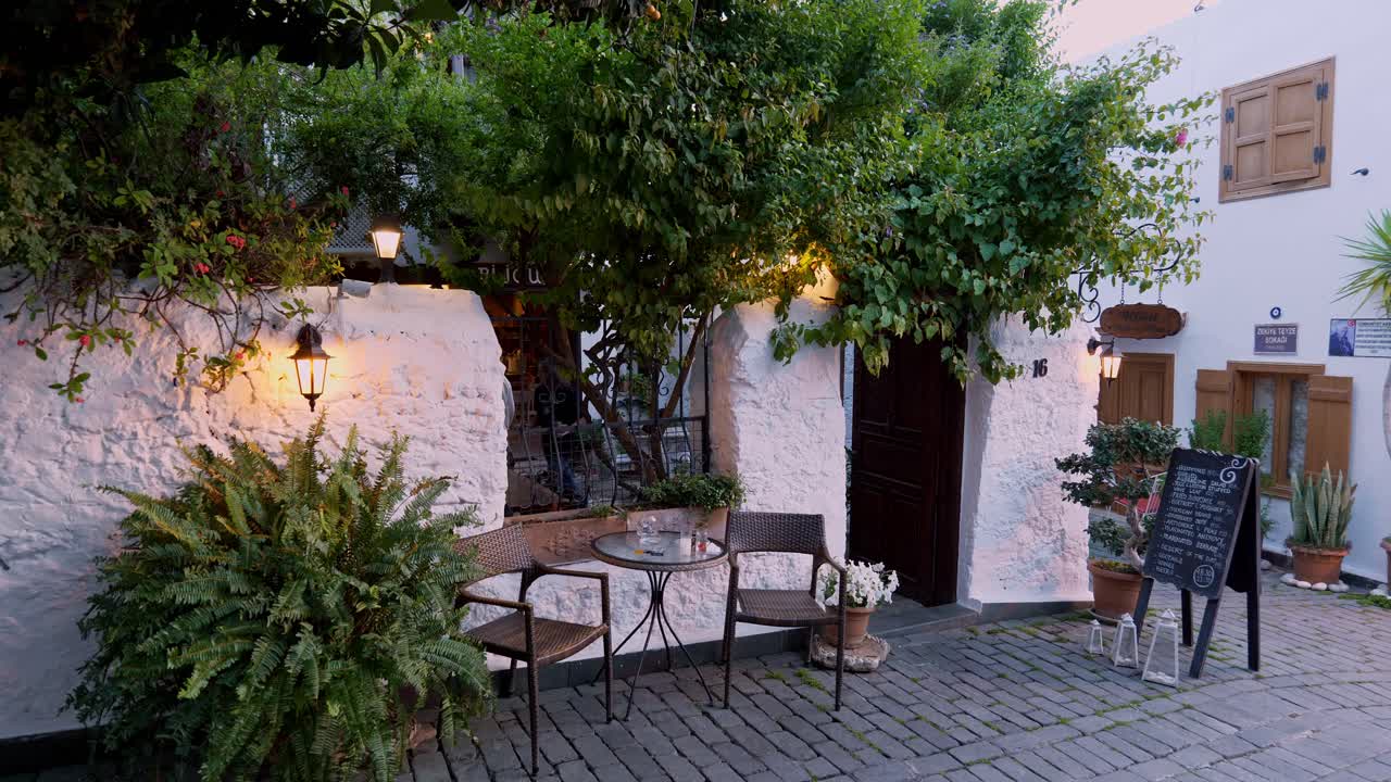 Restaurant seating in quiet back cobbled street of holiday resort Kas