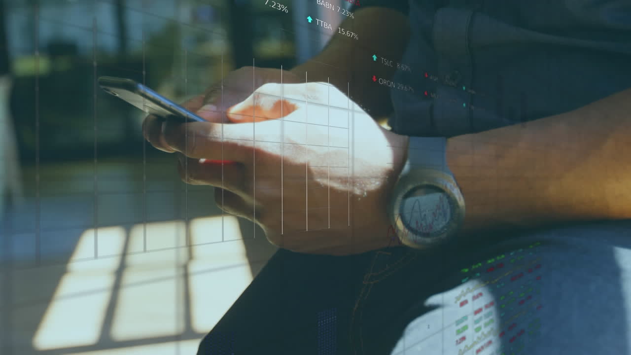 Animation of statistical and stock market data processing over mid section of man using smartphone