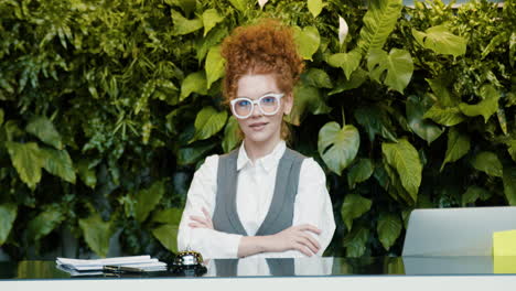 redheaded receptionist in a hotel