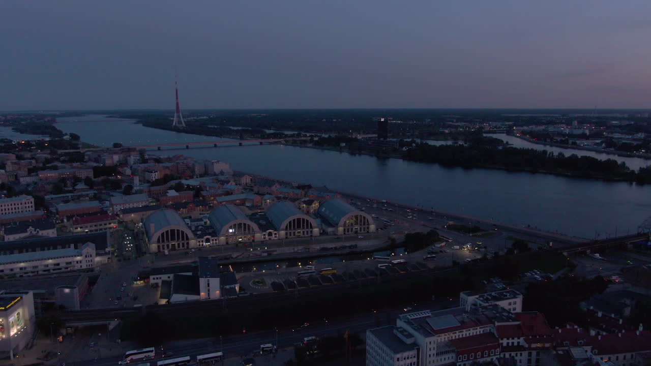 Drone shot of beautiful city and river at sunset