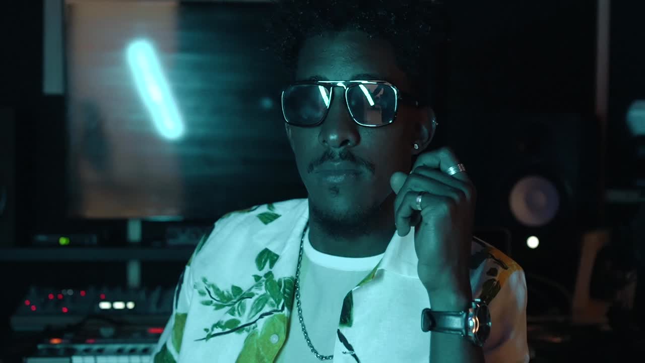 Man in Sunglasses in Music Studio