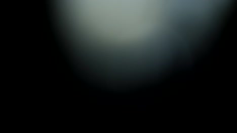 abstract light leaks on black background.