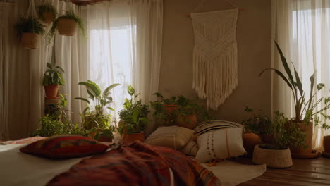 sunlit bohemian bedroom with abundant indoor plants and macrame decor