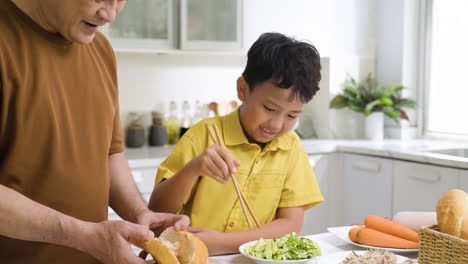 man and boy in the kitchen