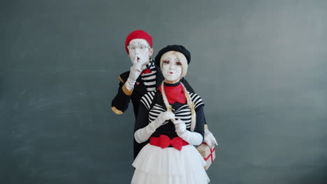 mime couple with gift