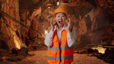 surprised woman miner in a tunnel
