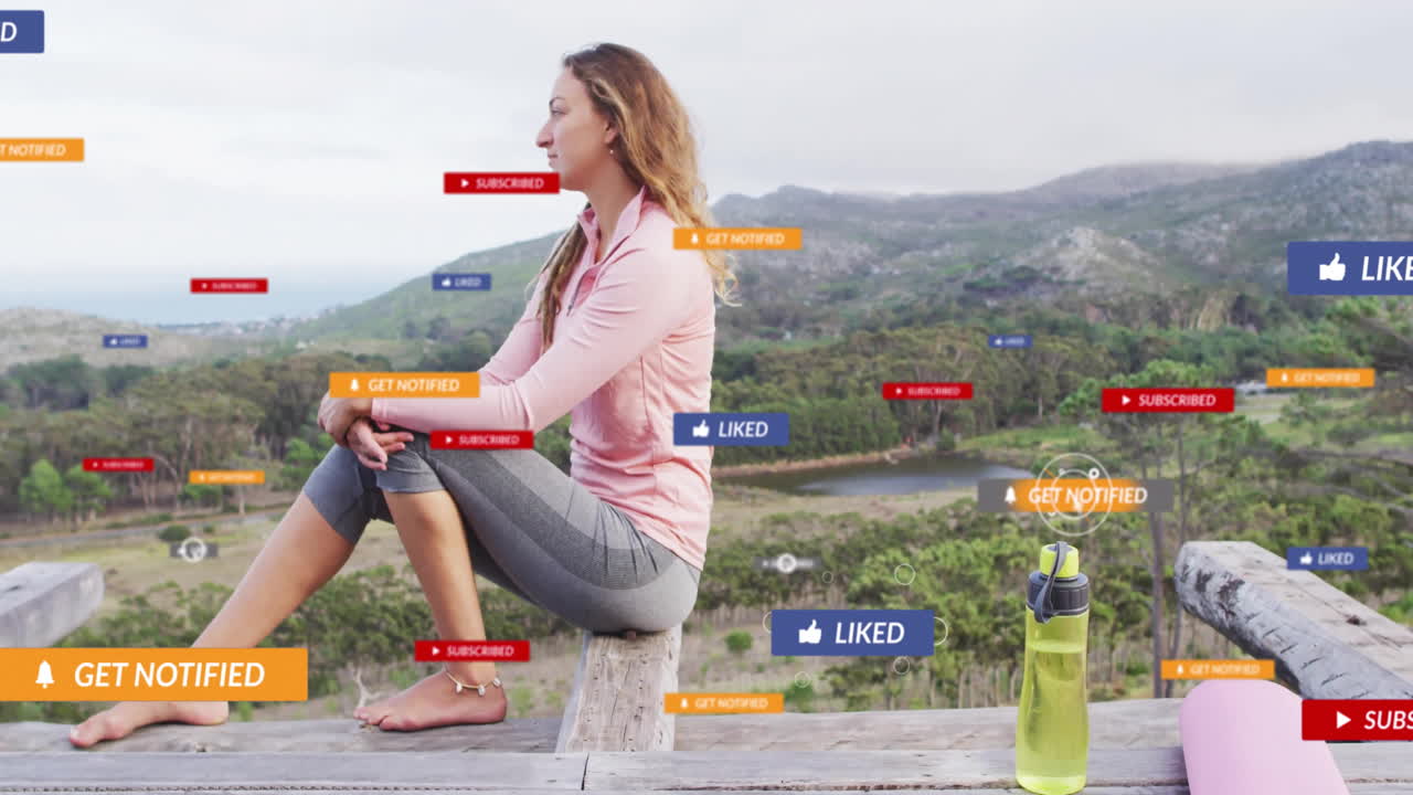 woman sitting overlooking valley, floating social media icons boosting marketing metrics