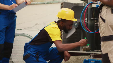 workers tasked with condenser cleaning