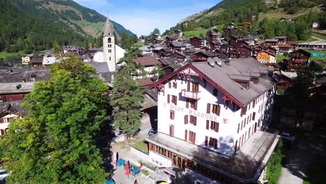 aerial shot of typical swiss alpine village