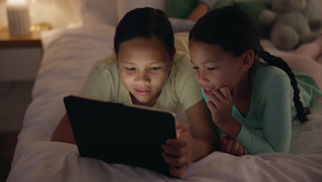 Happy-girl-kids,-tablet-and-bed-at-night
