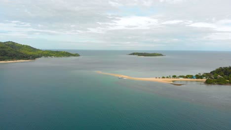 aerial reveal of an island situated on remote area in the philippines
