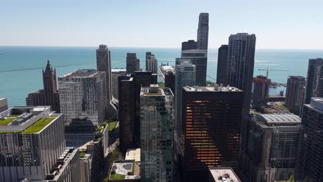 chicago usa downtown skyscrapers and towers with lake michigan in background, drone shot