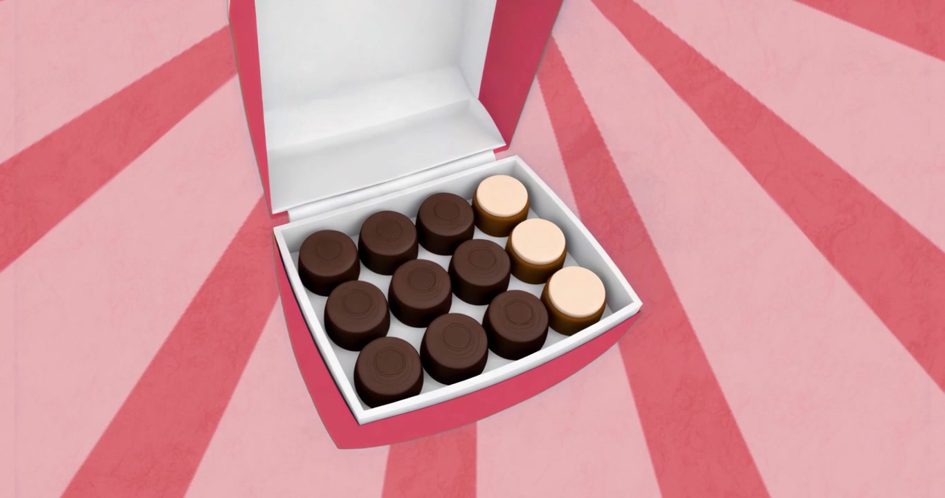 Una scatola a forma di cuore entra nell'inquadratura, ruota, il coperchio si solleva per rivelare i cioccolatini e poi si chiude, ripetendo.