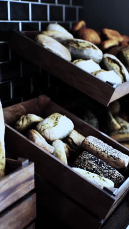 a display of fresh baked bread in a bakery