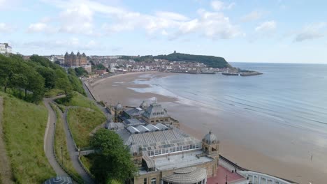 Aerial-bird's-eye-view-of-Scarborough-town,-beach,-harbour-and-castle