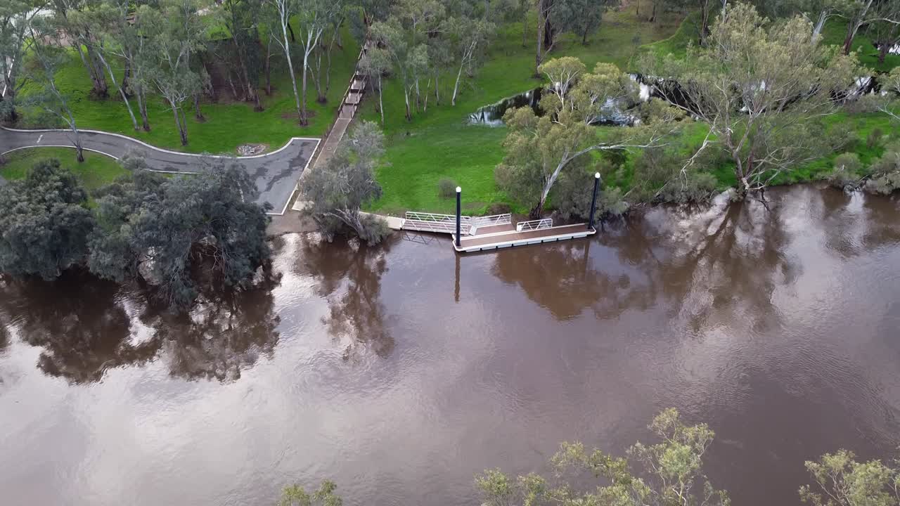 Aerial Tilt Down View Over Flooded Swan River
