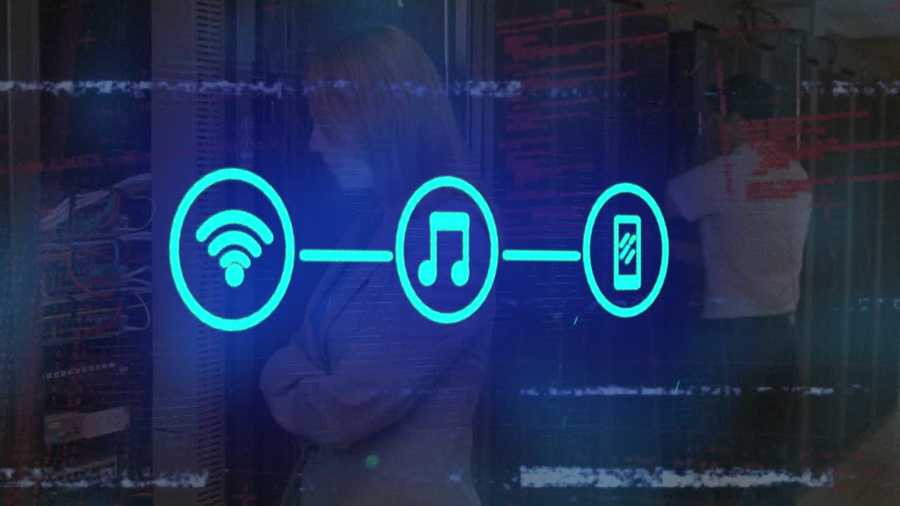 Animation of media icons over caucasian workers in server room