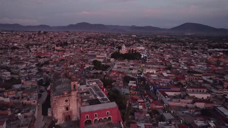 Aerial-shot-at-sunset-of-the-center-of-Atlixco-Puebla-Mexico