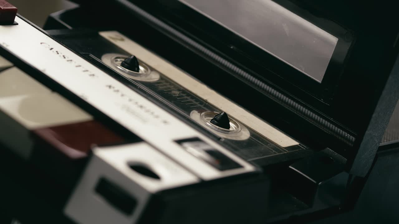 Cassette tape recorder playing CLOSE-UP angle