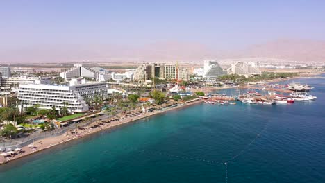 aerial footage of hotels and resorts at eilat, beautiful city at south israel on the red sea shore