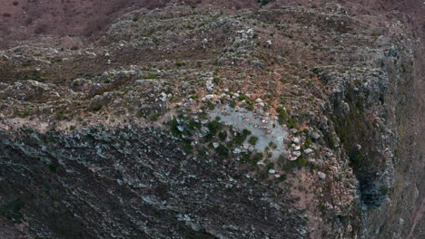 Lion's-Head-from-above-with-youg-people-watching-the-sunset-in-Cape-Town