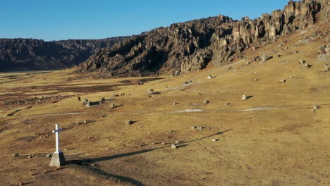 Andean-landscape-and-white-cross