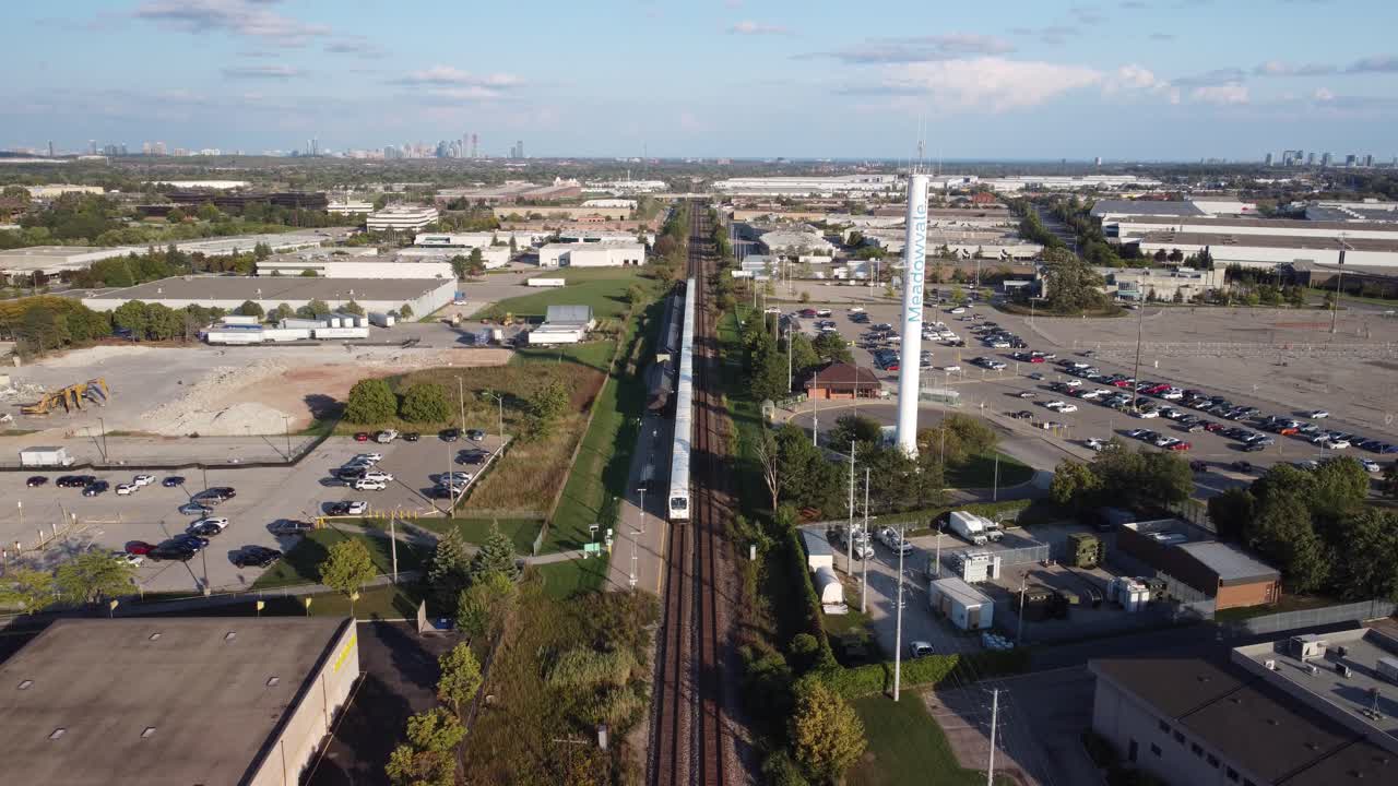 Static drone view on train tracks in an industrial area