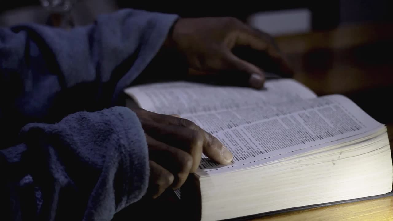 praying to God with bible faithfully worshipping with people stock footage stock video
