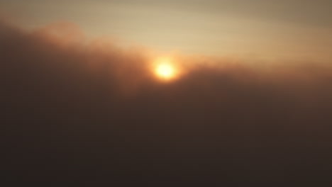 sunrise/sunset over clouds