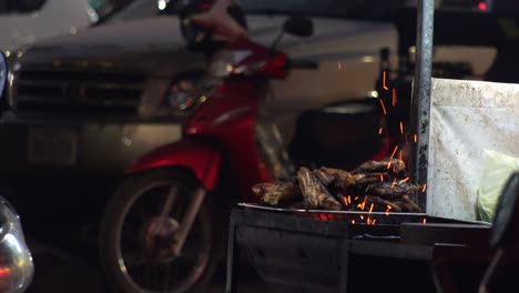 Medium-Exterior-Shot-of-Meat-on-BBQ-on-a-Roadside-Stall