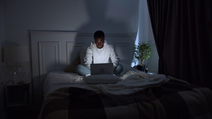 Young man on bed