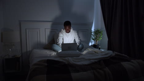 Young-man-on-bed