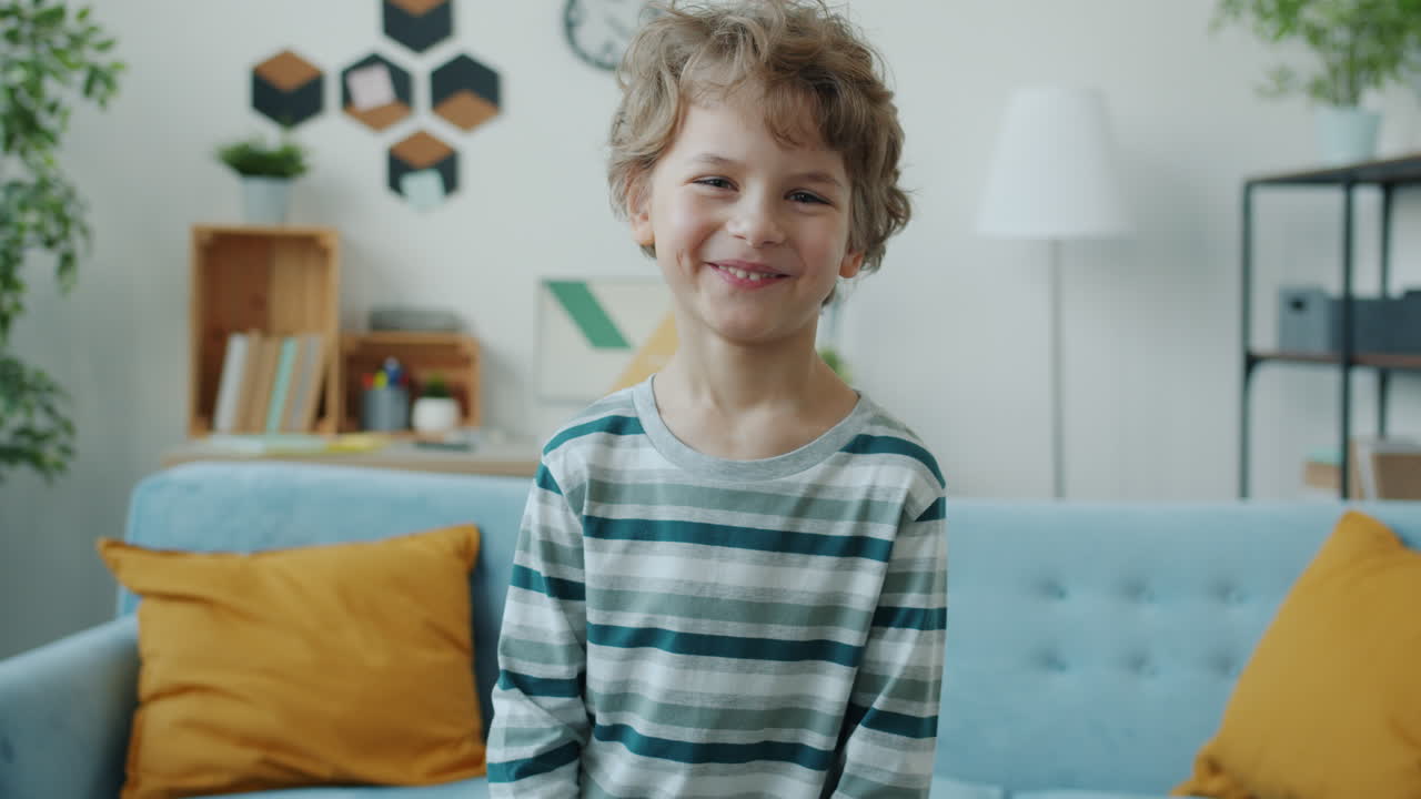 Smiling Boy in Living Room