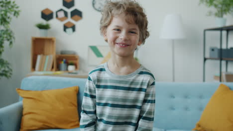 smiling boy in living room