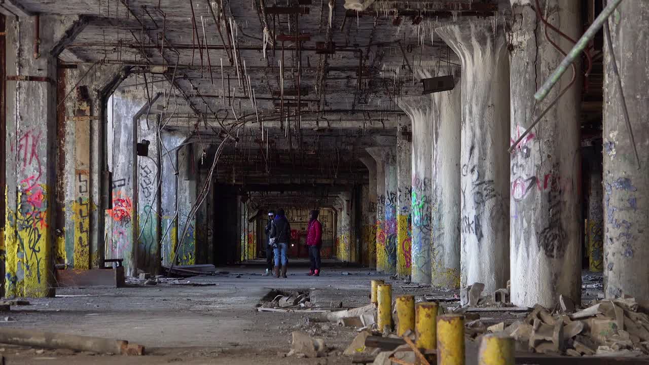 Black kids rap dance and congregate in the abandoned buildings of Detroit Michigan