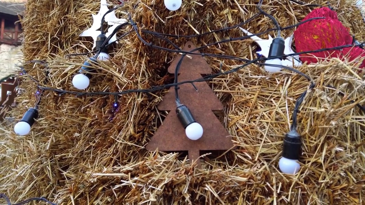 Christmas composition of hay and garlands.