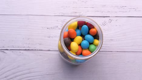 top view of colorful chocolate in a jar