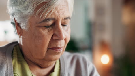 close-up portrait of a thoughtful senior woman