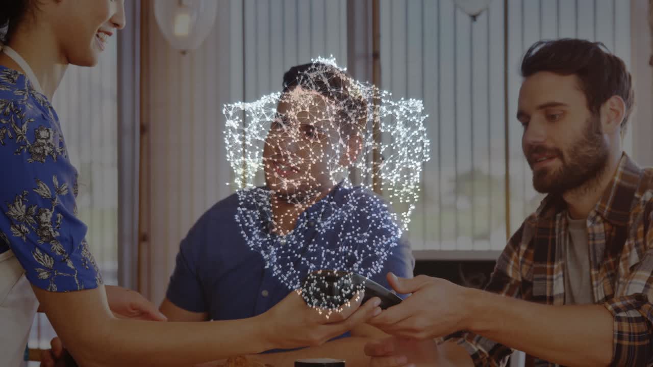 animación de la red de conexiones con escudo de seguridad sobre las personas que utilizan el terminal de pago
