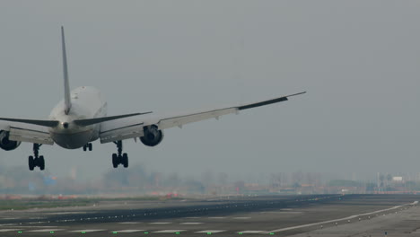 airplane landing on runway