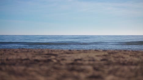 empty beach with sand out of focus