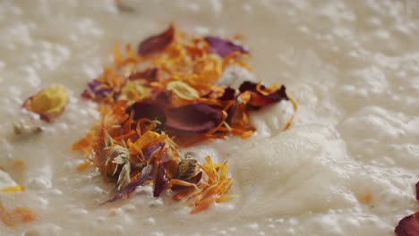 preparing edible flowers while boiling in the pan