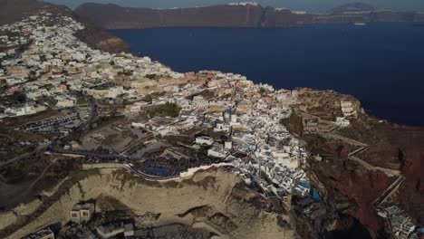 views from the sky looking over oia, santorini