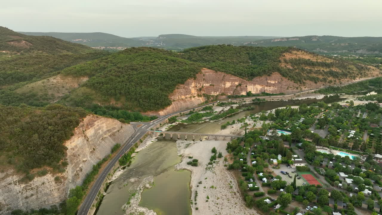 Ardèche River and Sandaya Soleil Vivarais Campsite Aerial Dolly Out